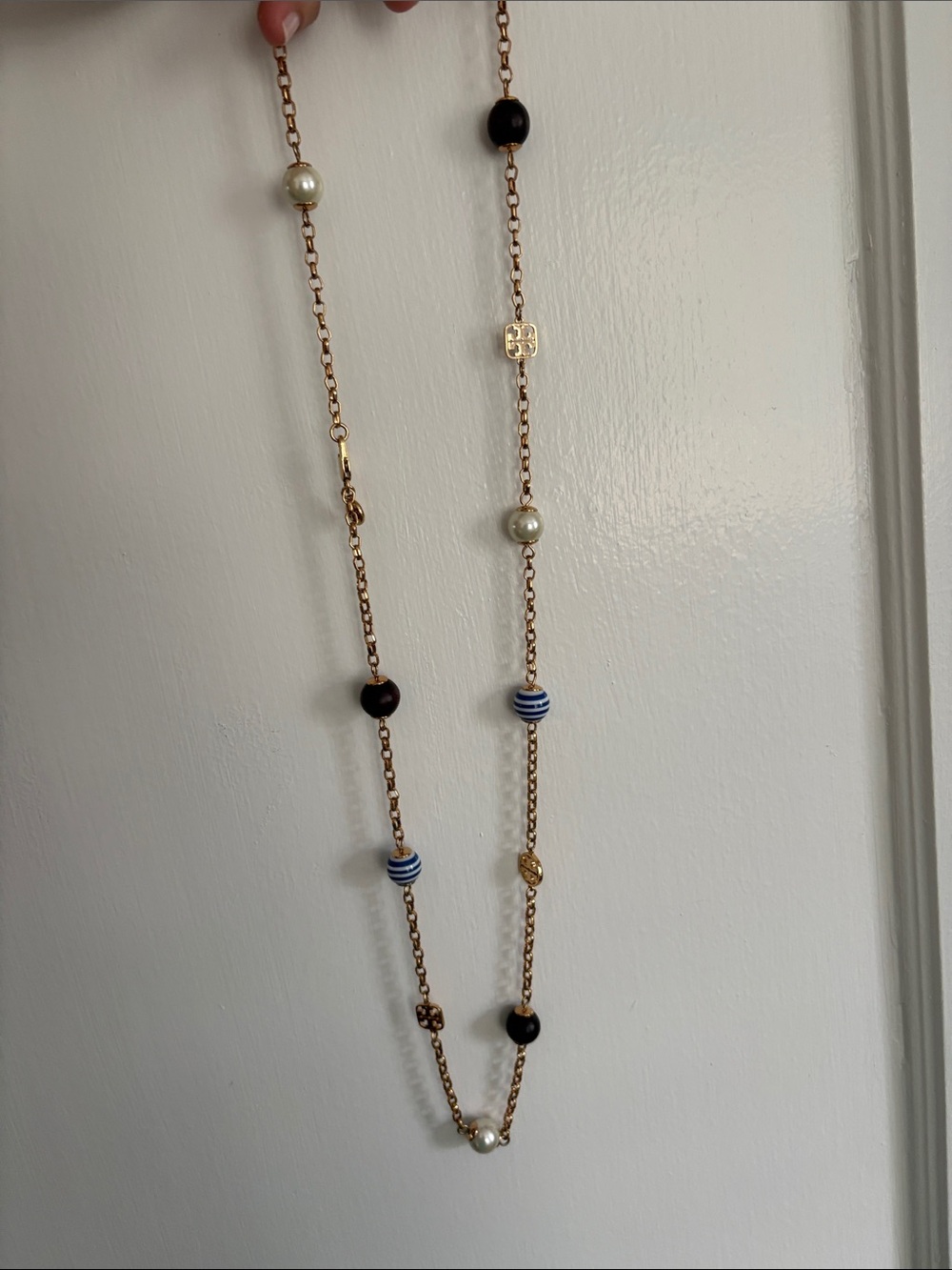Tory Burch gold brass logo station necklace